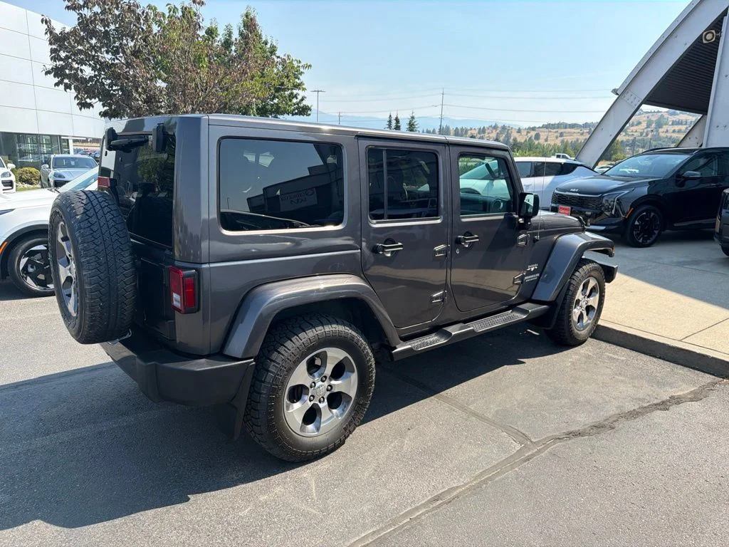 Used 2016 Gray Jeep Unlimited Sahara image 2