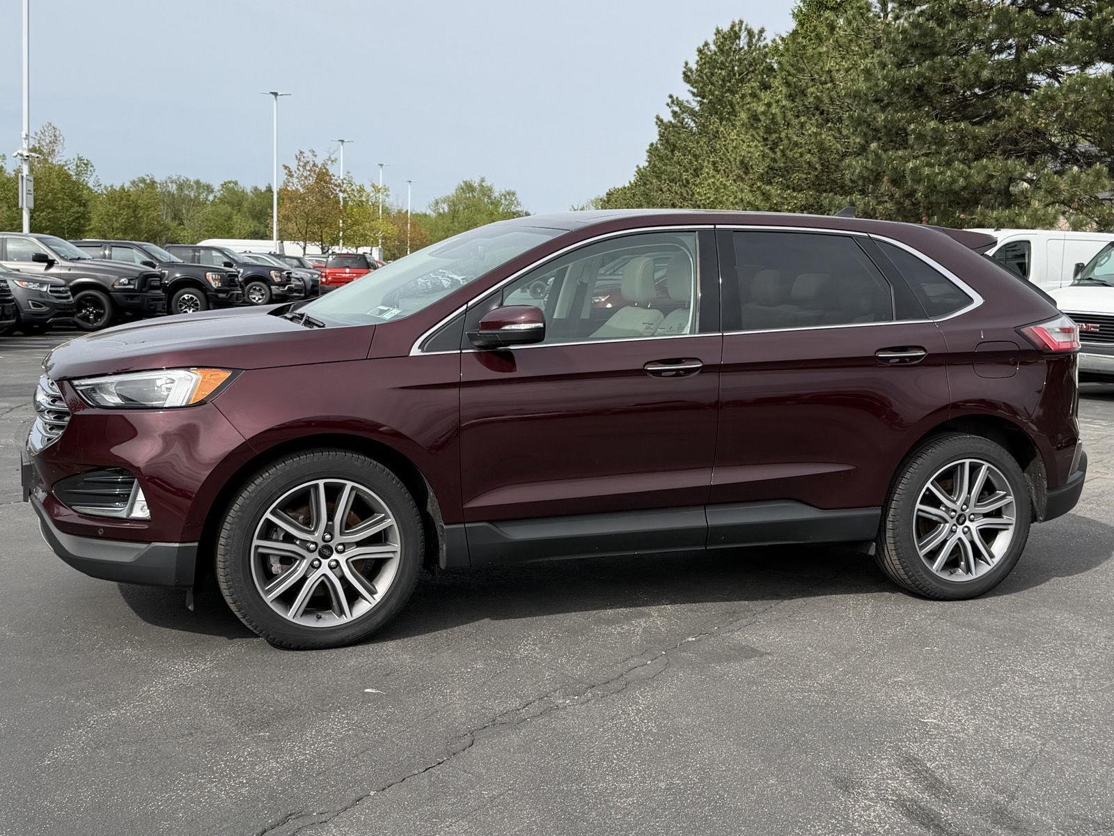 Used 2023 Burgundy Velvet Metallic Tinted Clearcoat Ford Titanium image 4