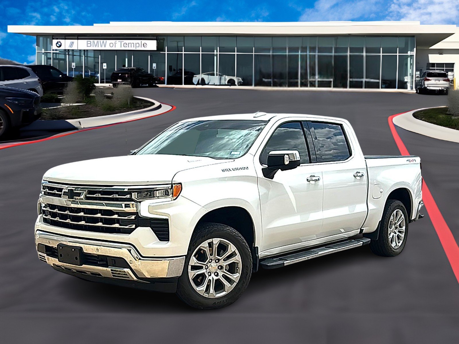 Used 2023 Summit White Chevrolet 4WD Crew Cab Short Bed LTZ image 1