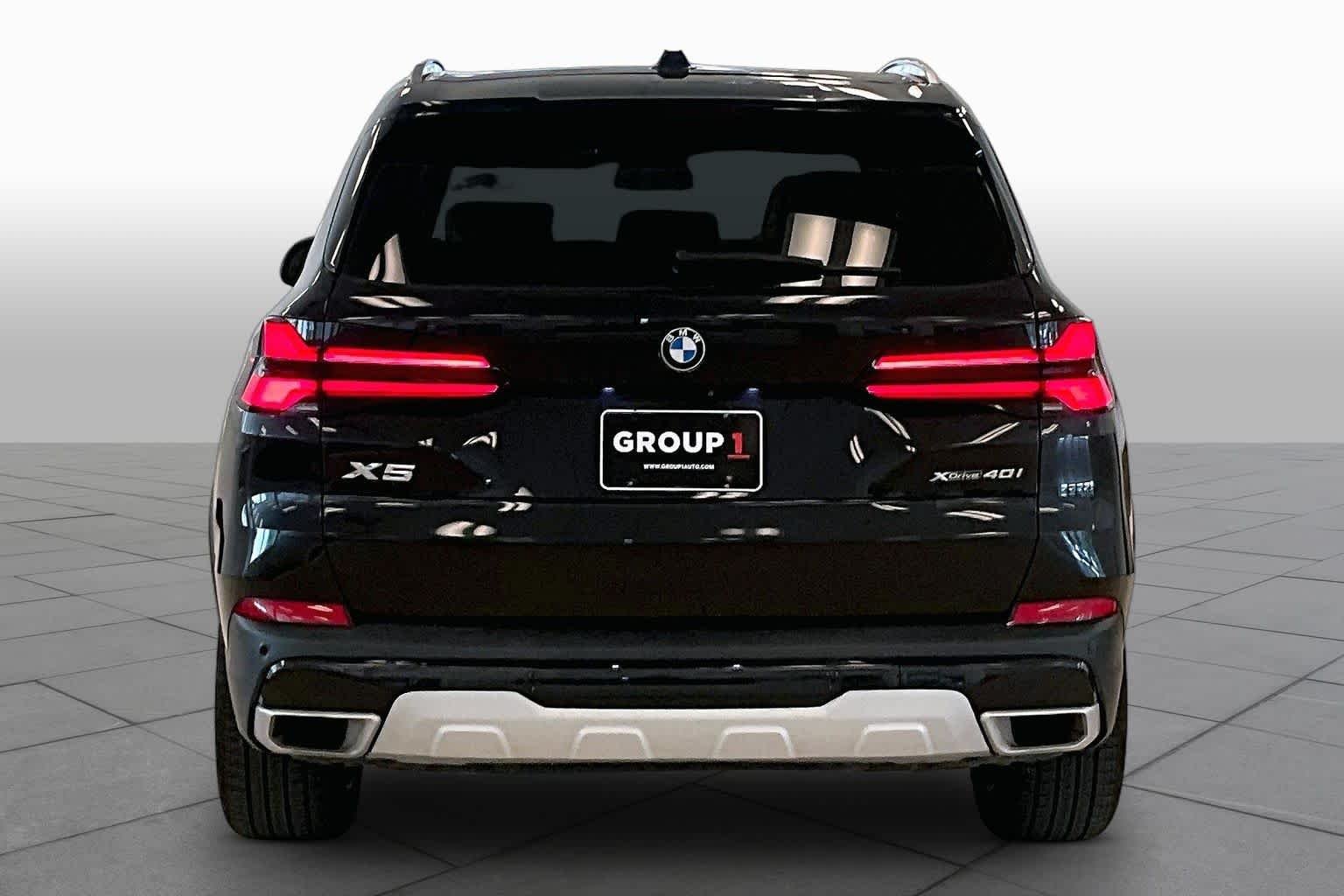 Used 2024 Black Sapphire Metallic BMW xDrive40i image 4