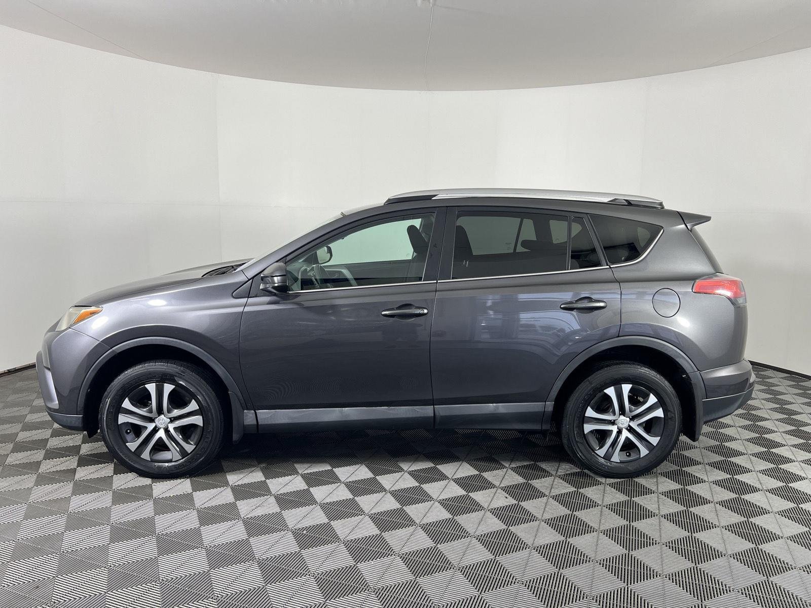 Used 2016 Magnetic Gray Metallic Toyota LE image 6