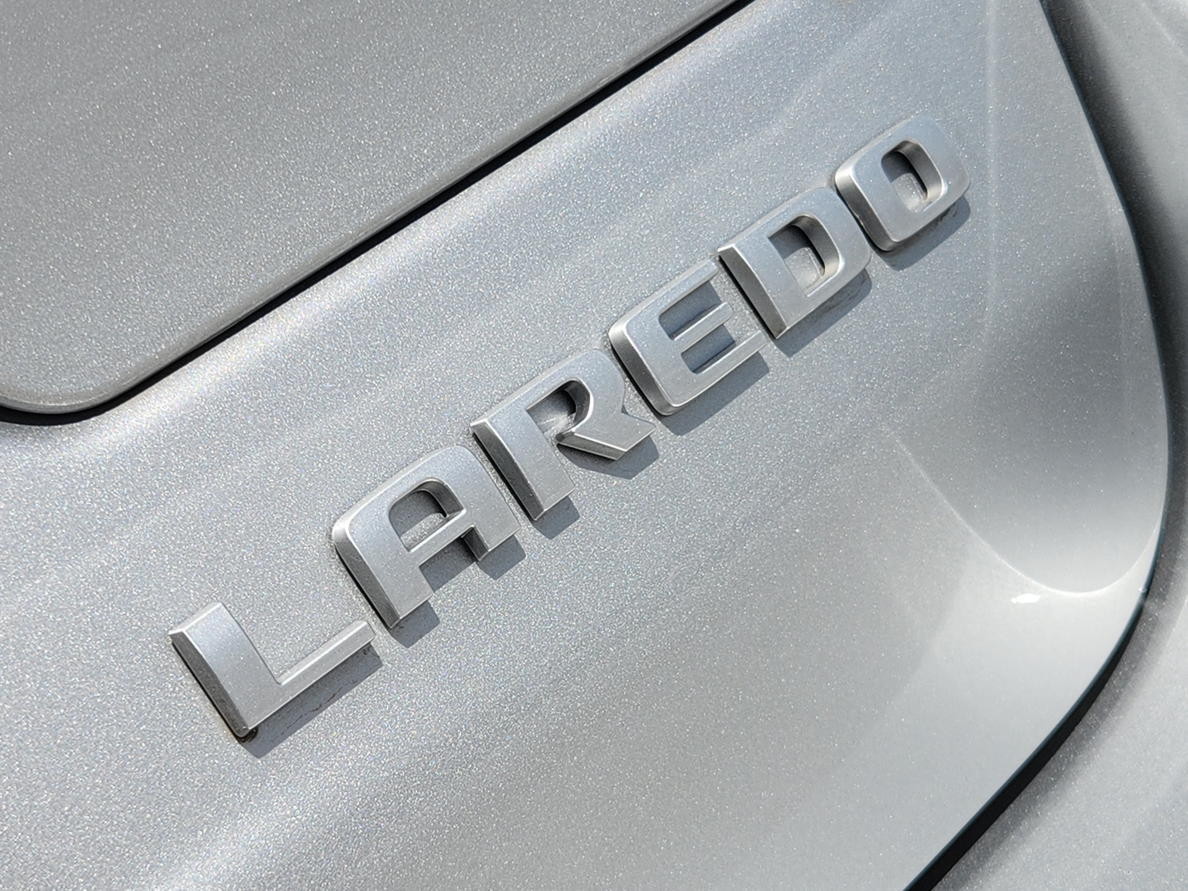 New 2026 Silver Zynith Exterior Paint Jeep Laredo X image 8