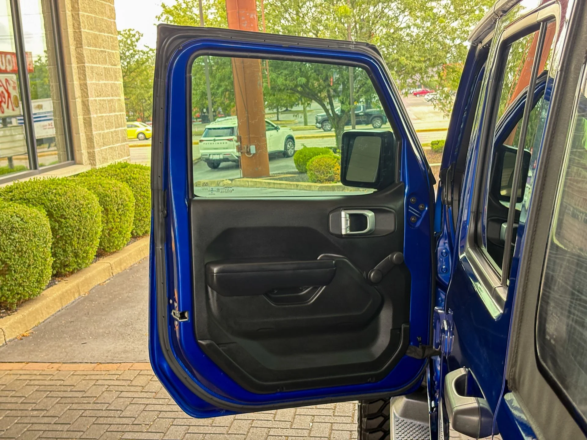 Used 2019 Blue Jeep Unlimited Sport image 14