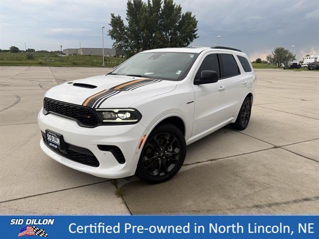 Used 2023 White Knuckle Clearcoat Dodge Hemi Orange image 1