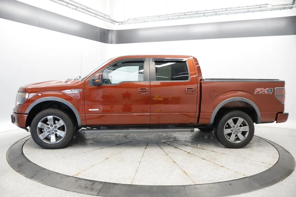 Used 2014 Ford F-150 FX4 with VIN 1FTFW1ET7EKF24890 for sale in Coon Rapids, Minnesota