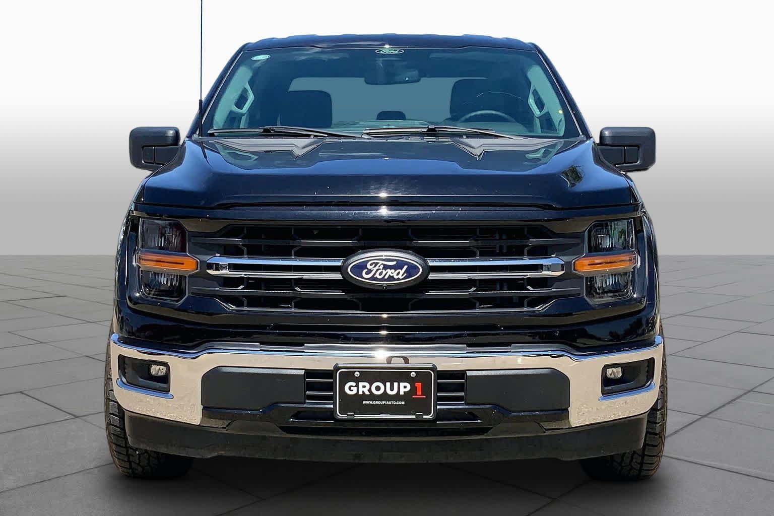 Used 2024 Agate Black Metallic Ford XLT image 4