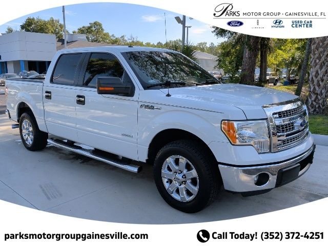 Used 2013 Oxford White Ford XLT image 1