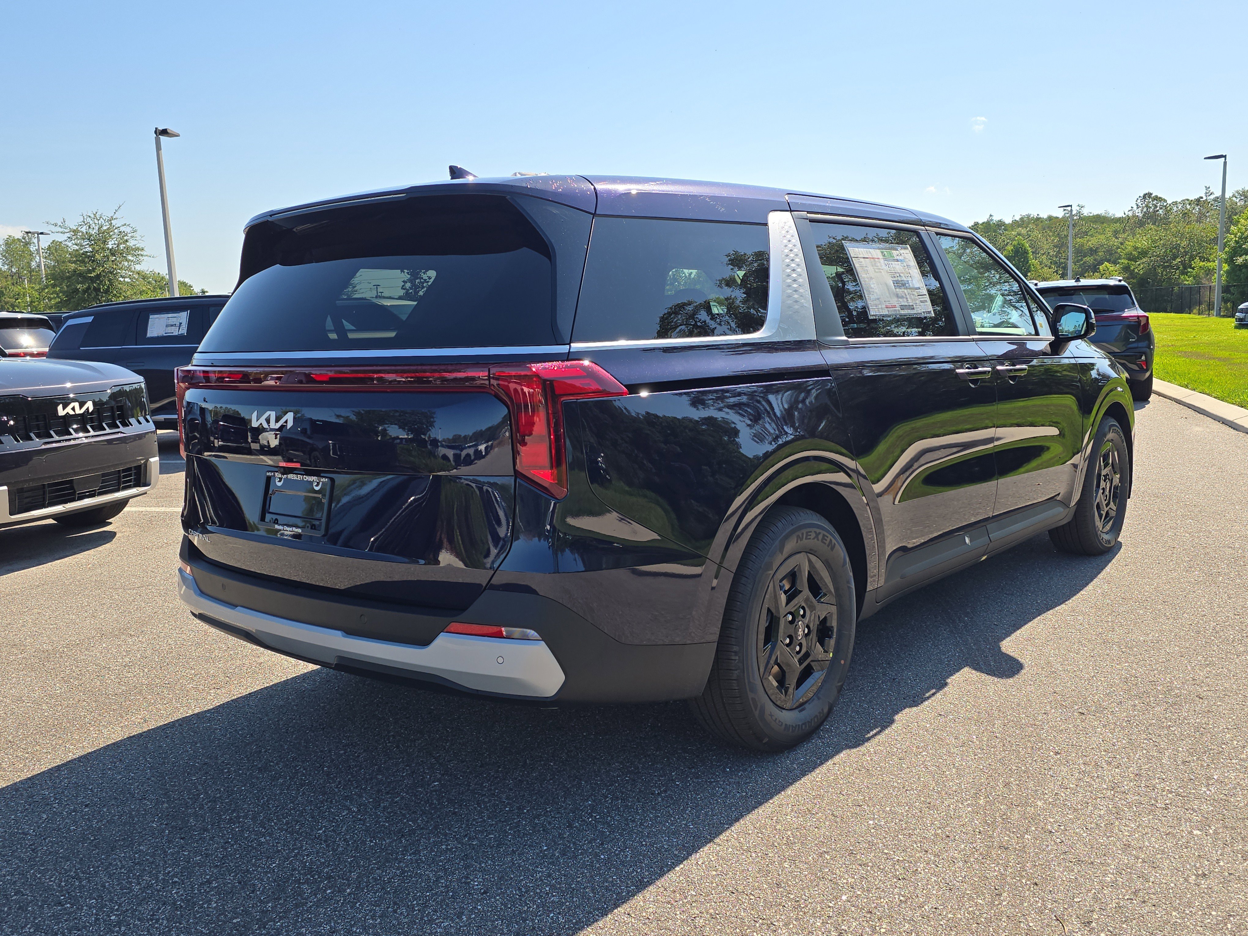 New 2026 Deep Chroma Blue Kia LXS image 8