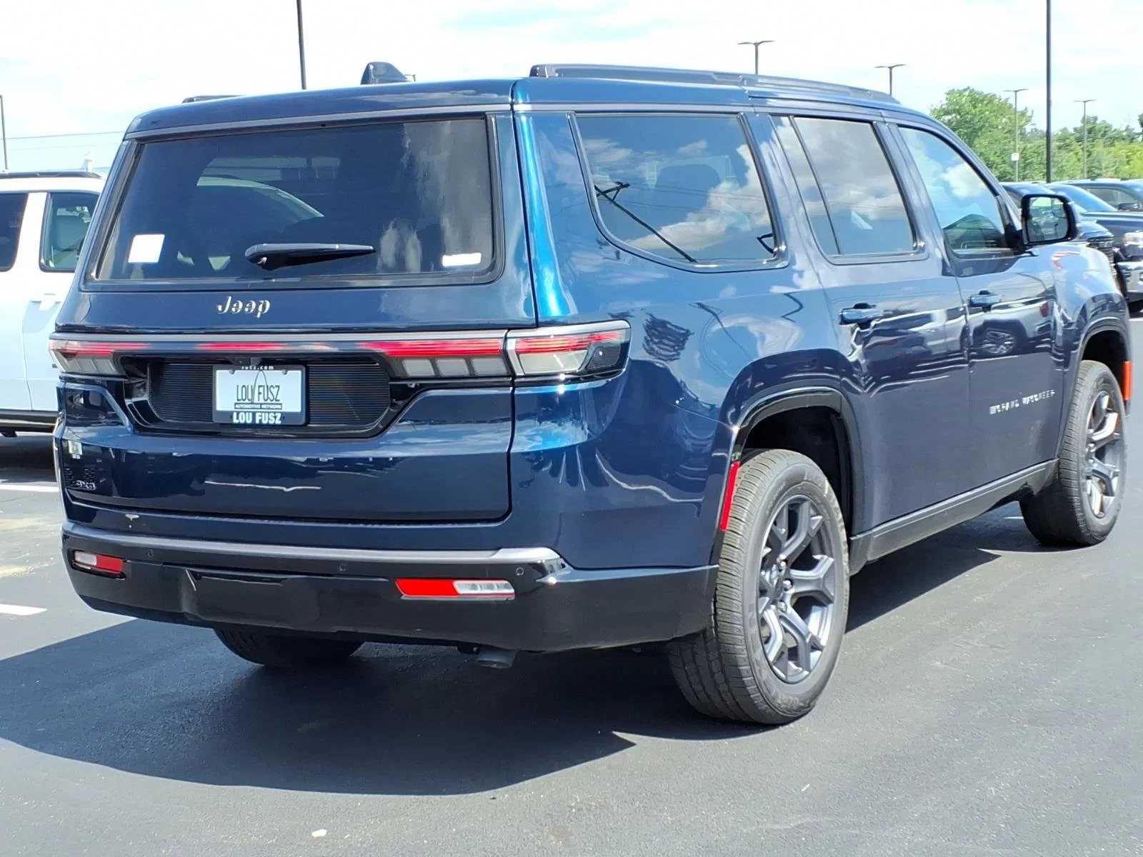 New 2026 Fathom Blue Pearlcoat Jeep Limited Altitude image 18