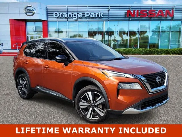 Used 2022 Orange Nissan Platinum image 1