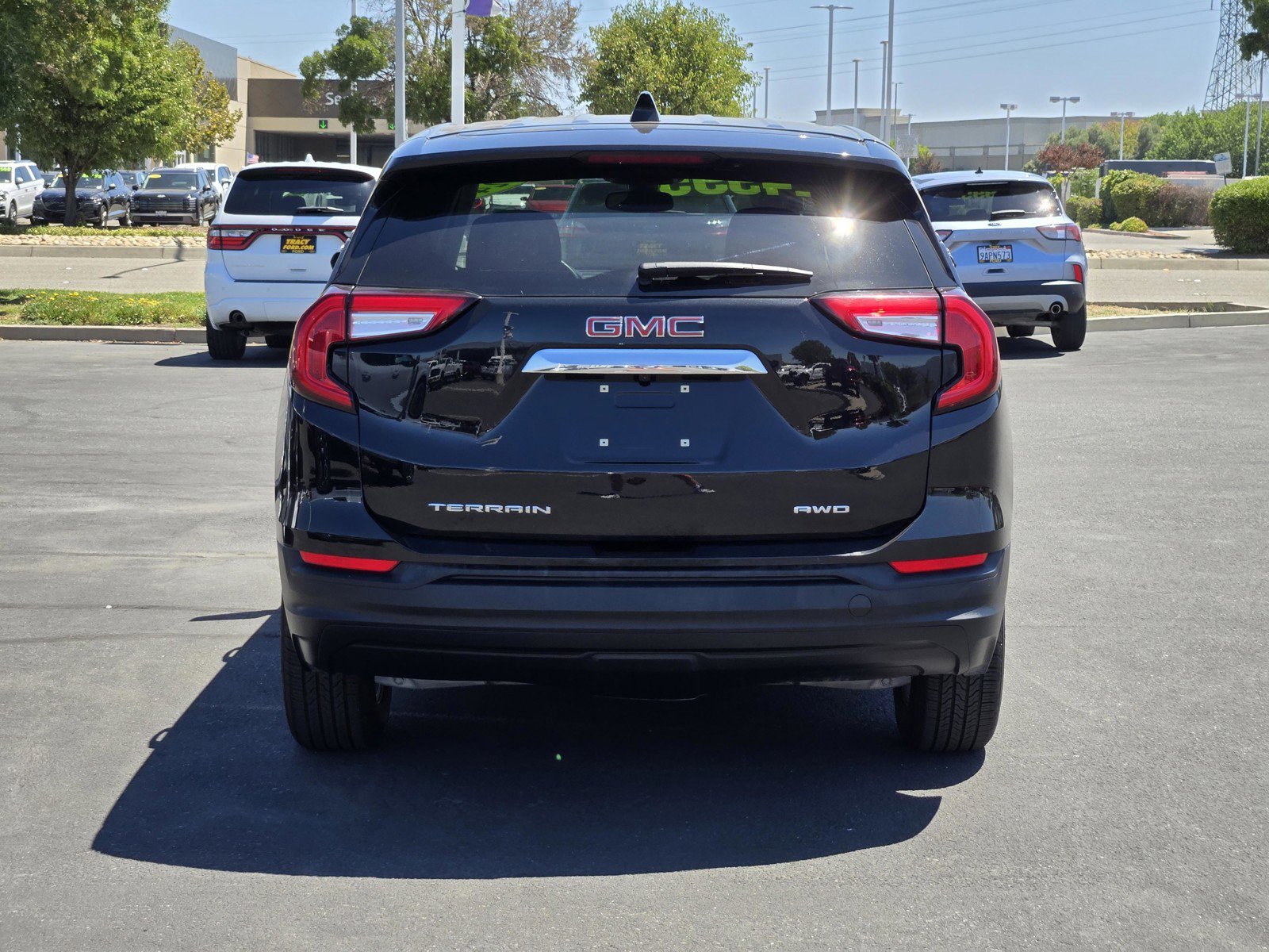 Used 2024 Ebony Twilight Metallic GMC SLE image 5