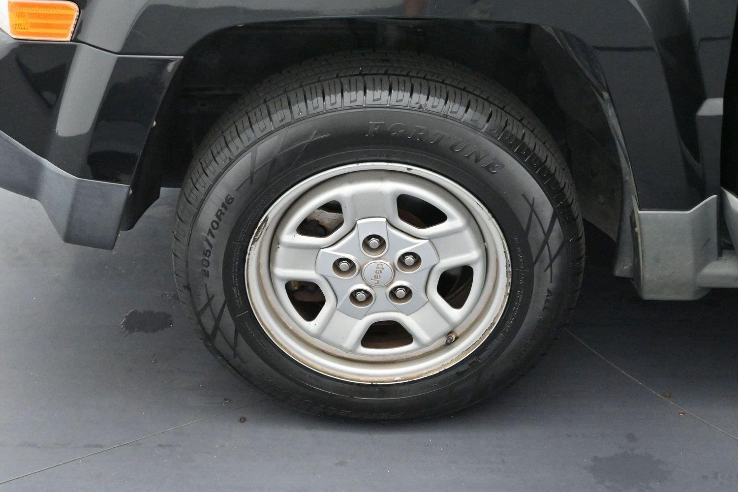 Used 2011 Brilliant Black Crystal Pearl Jeep Sport image 24