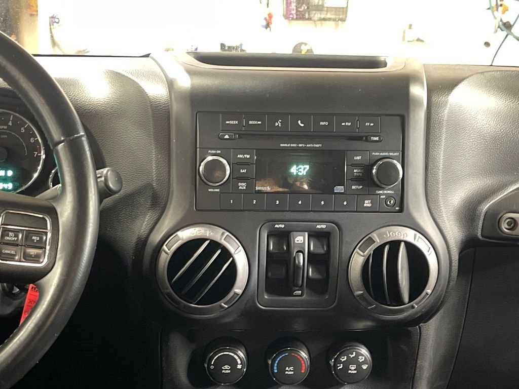 Used 2013 Black Jeep Unlimited Sport image 19