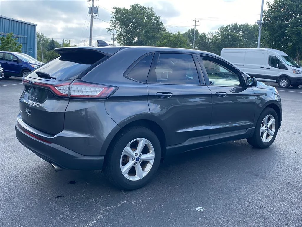 Used 2015 Magnetic Metallic Ford SE image 10