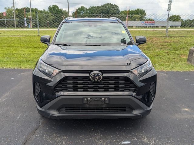 Used 2021 Midnight Black Metallic Toyota LE image 4