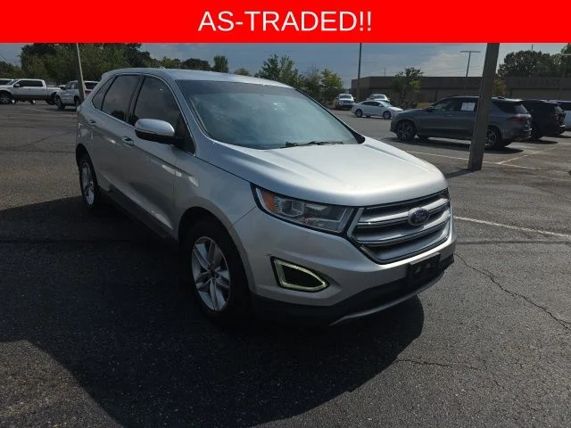 Used 2015 Ingot Silver Ford SEL image 1