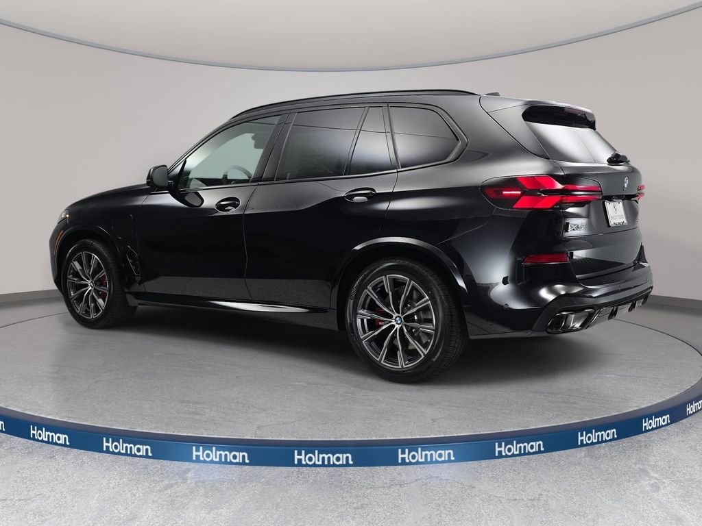 New 2026 Black Sapphire Metallic BMW xDrive50e image 7