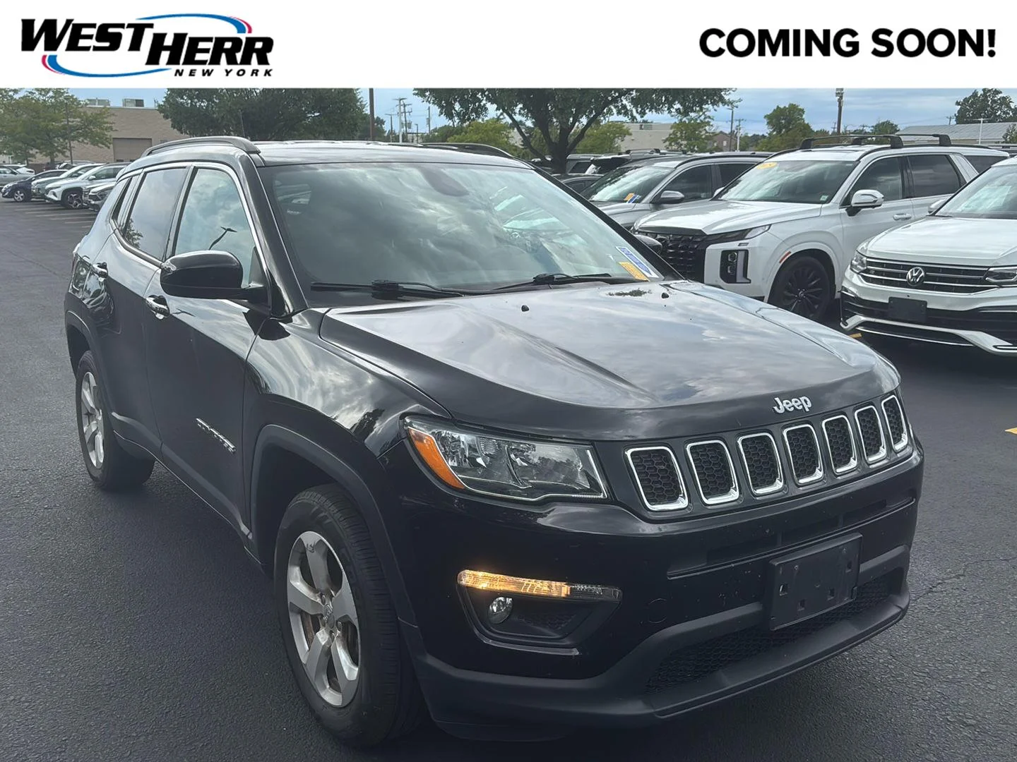 Used 2021 Diamond Black Crystal Pearlcoat Jeep Latitude image 1