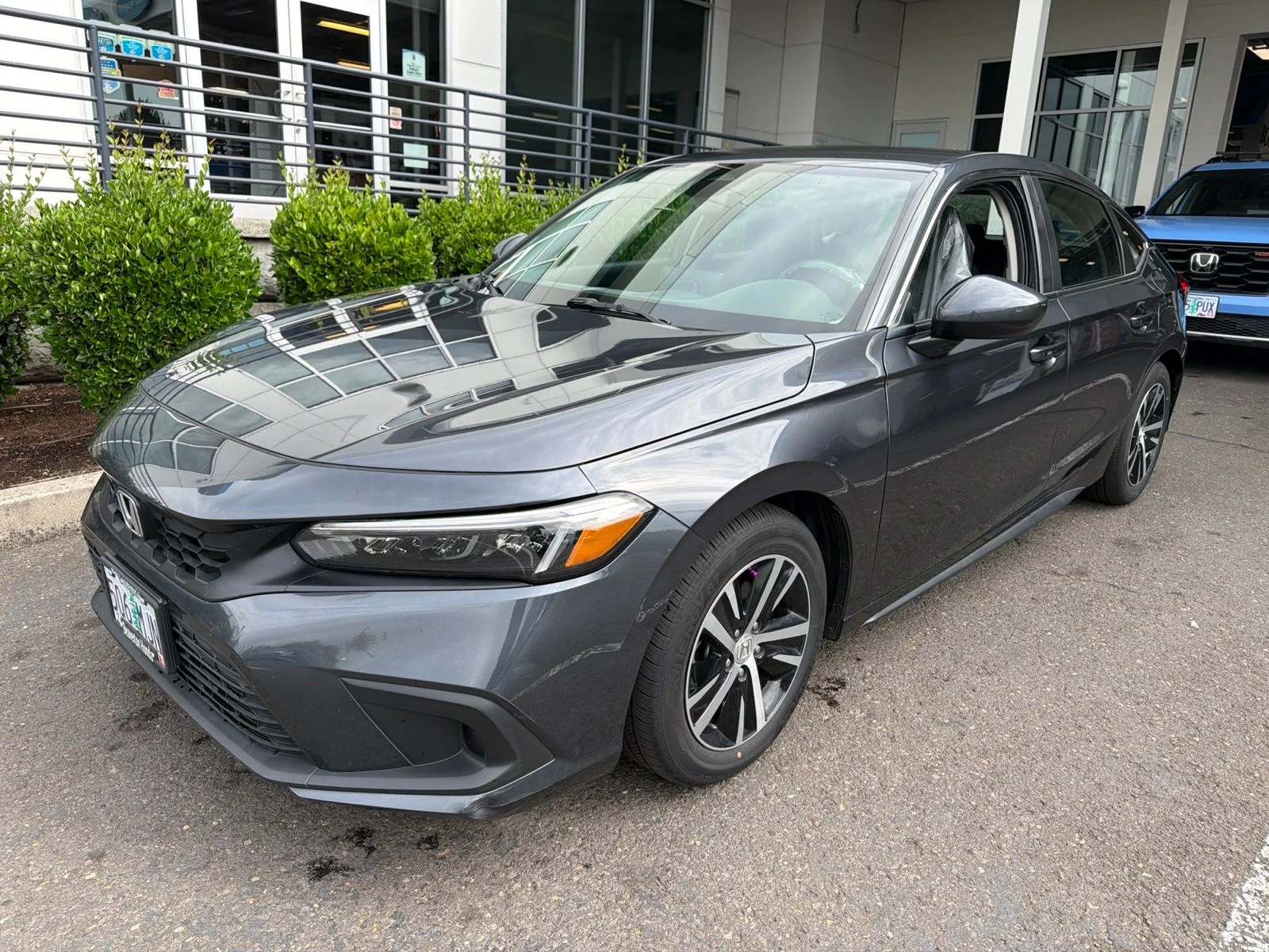 Used 2024 Meteorite Gray Metallic Honda LX image 1