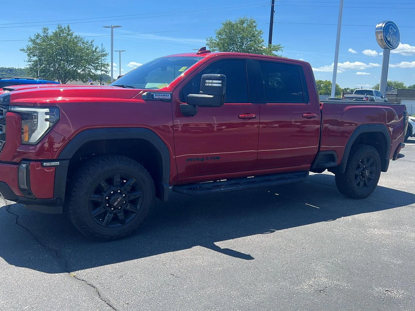 Used 2024 Volcanic Red Tintcoat GMC AT4 image 16
