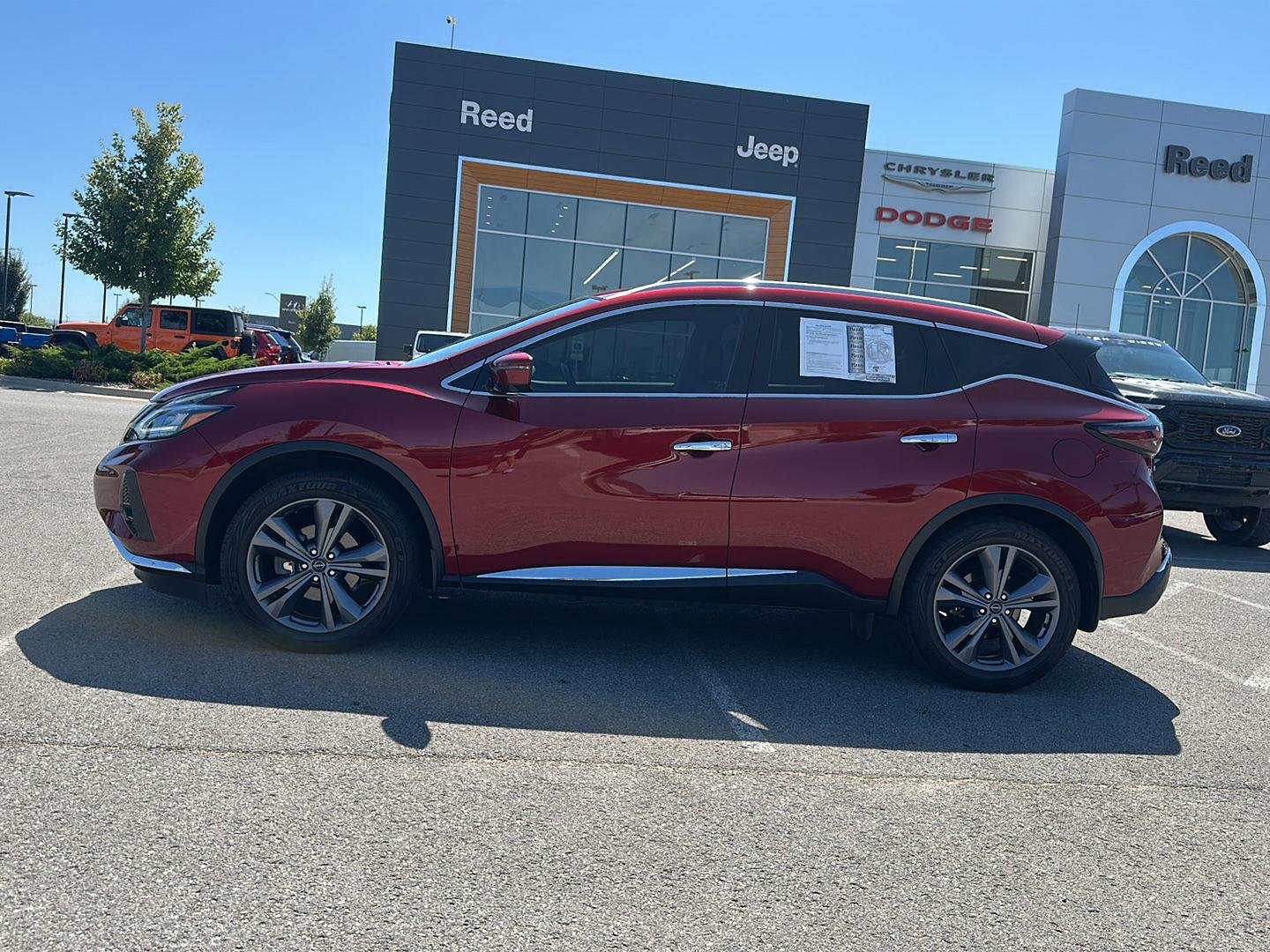 Used 2024 Scarlet Ember Tintcoat Nissan Platinum image 2