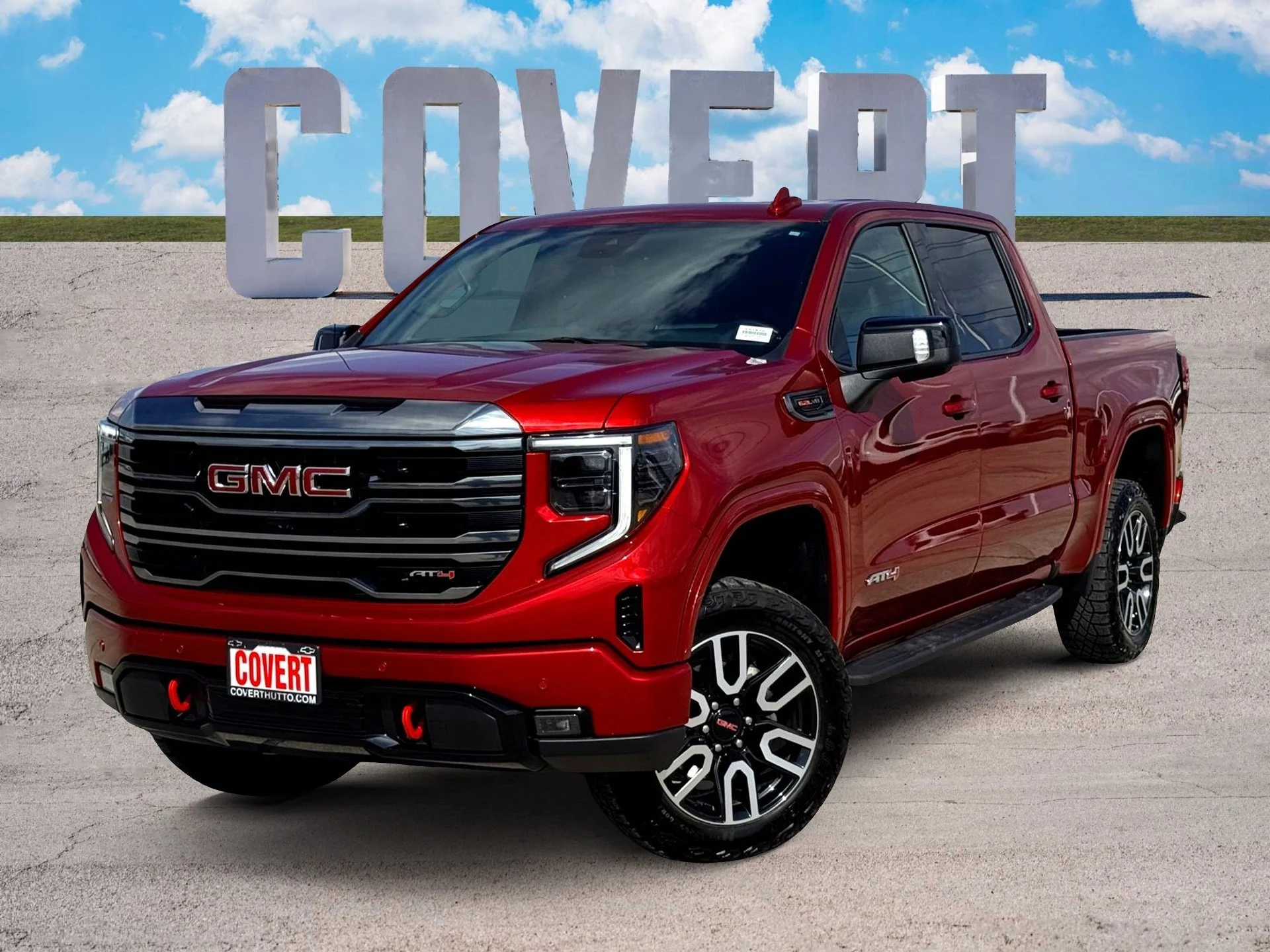 Used 2024 Volcanic Red Tintcoat GMC AT4 image 1