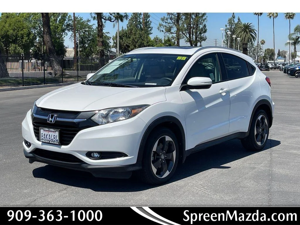 Used 2018 White Orchid Pearl Honda EX-L Navi image 1
