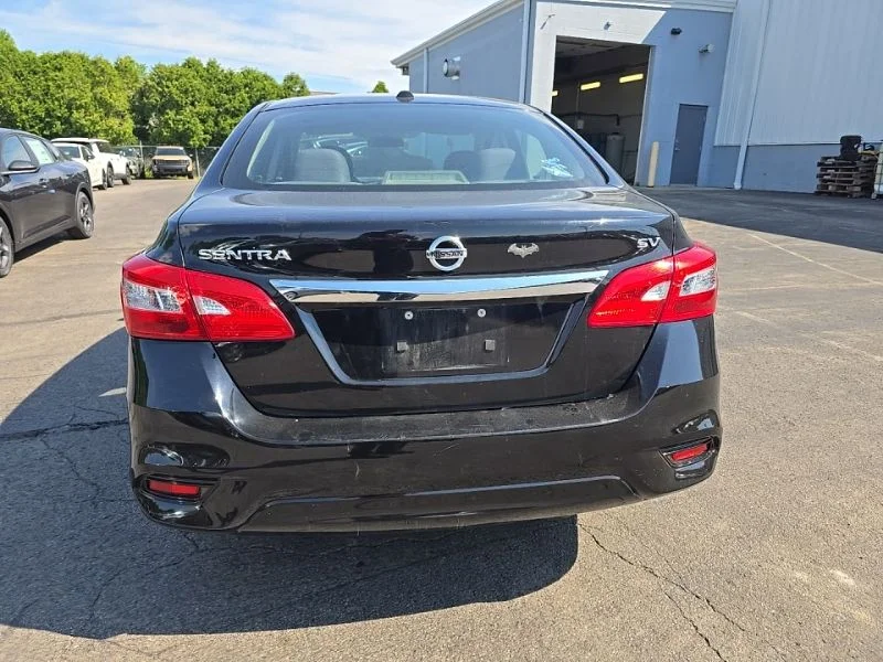 Used 2018 Black Nissan SV image 6