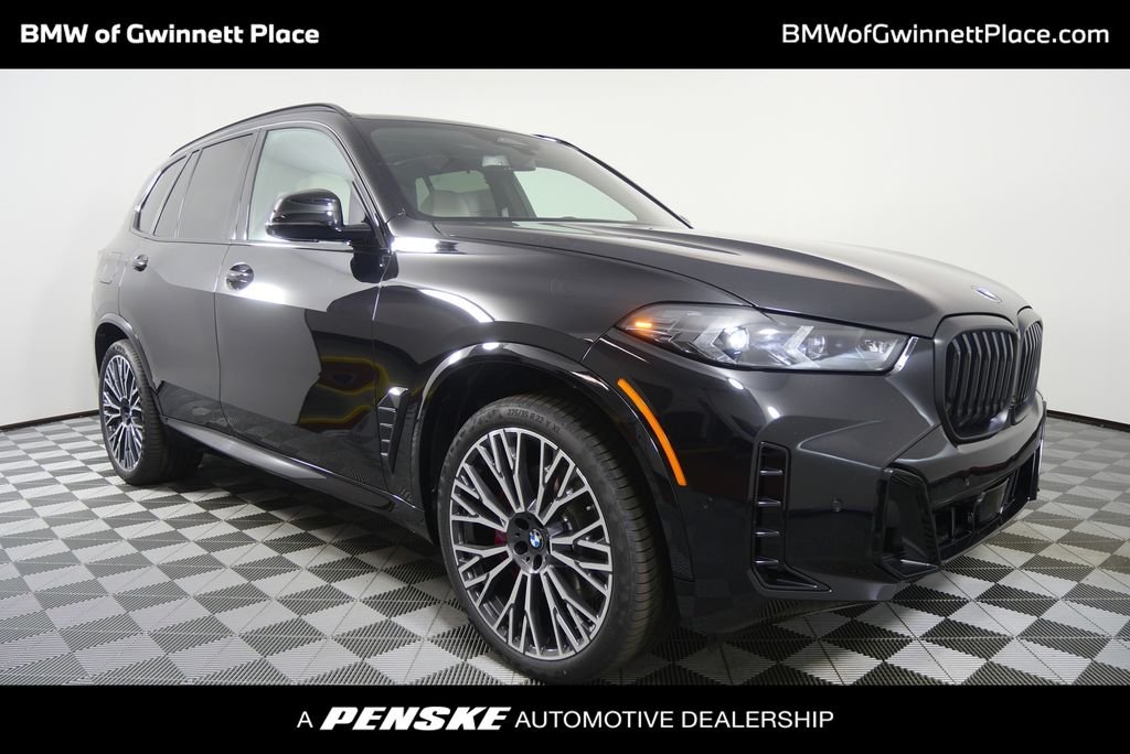 Used 2026 Black Sapphire Metallic BMW sDrive40i image 1