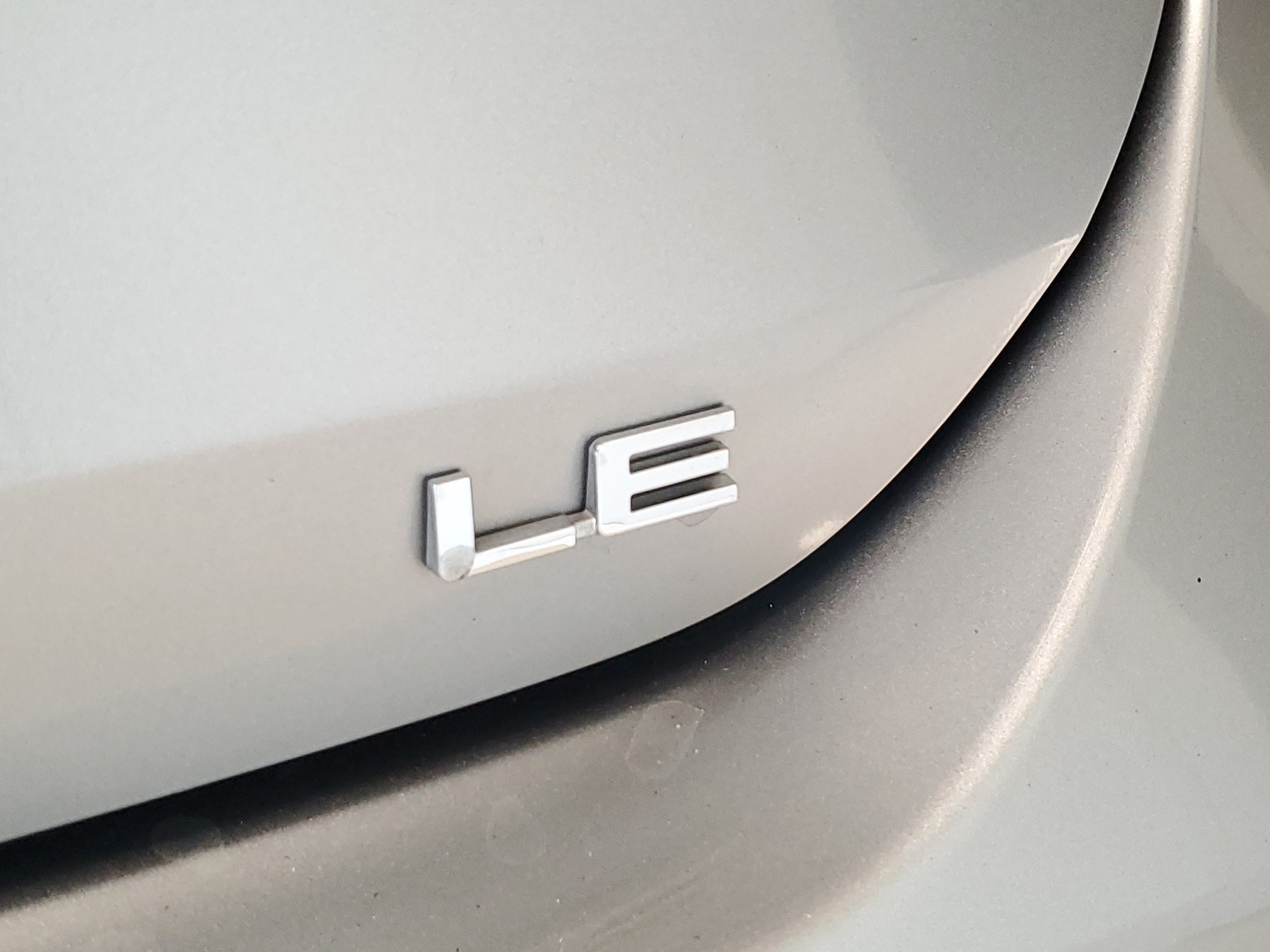 Used 2023 Celestial Silver Metallic Toyota LE image 8