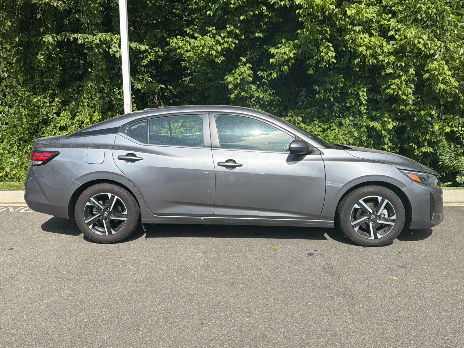 Used 2024 Gun Metallic Nissan SV image 6