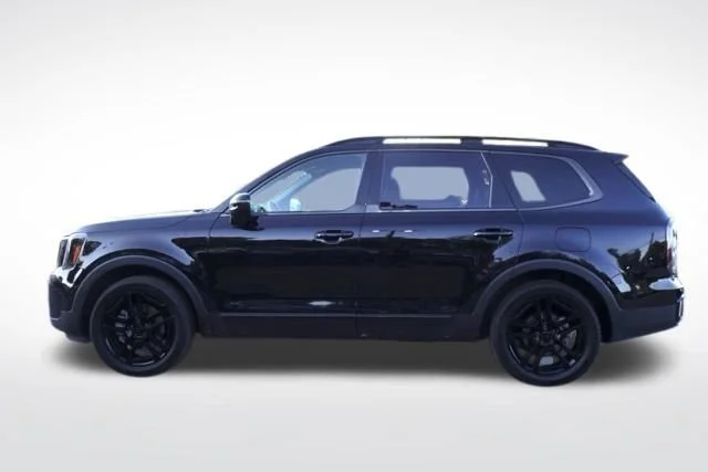 Used 2025 Black Kia EX X-Line image 7