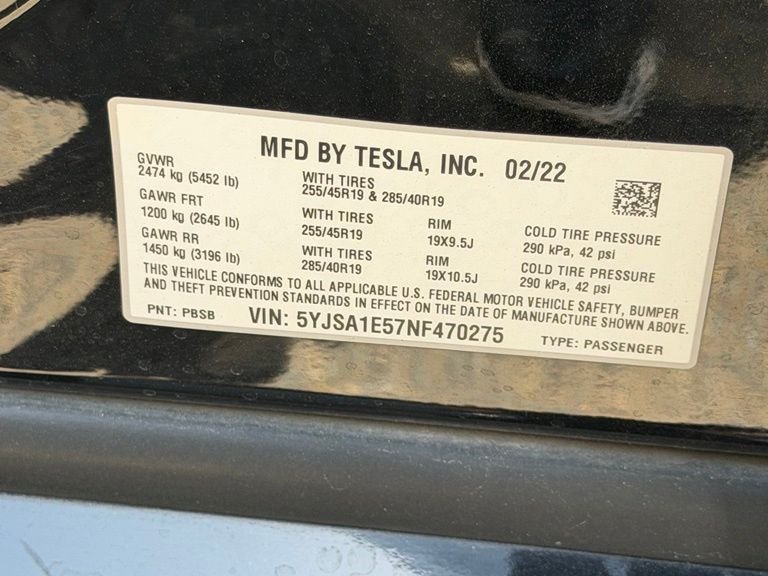 Used 2022 Solid Black Tesla Base image 3