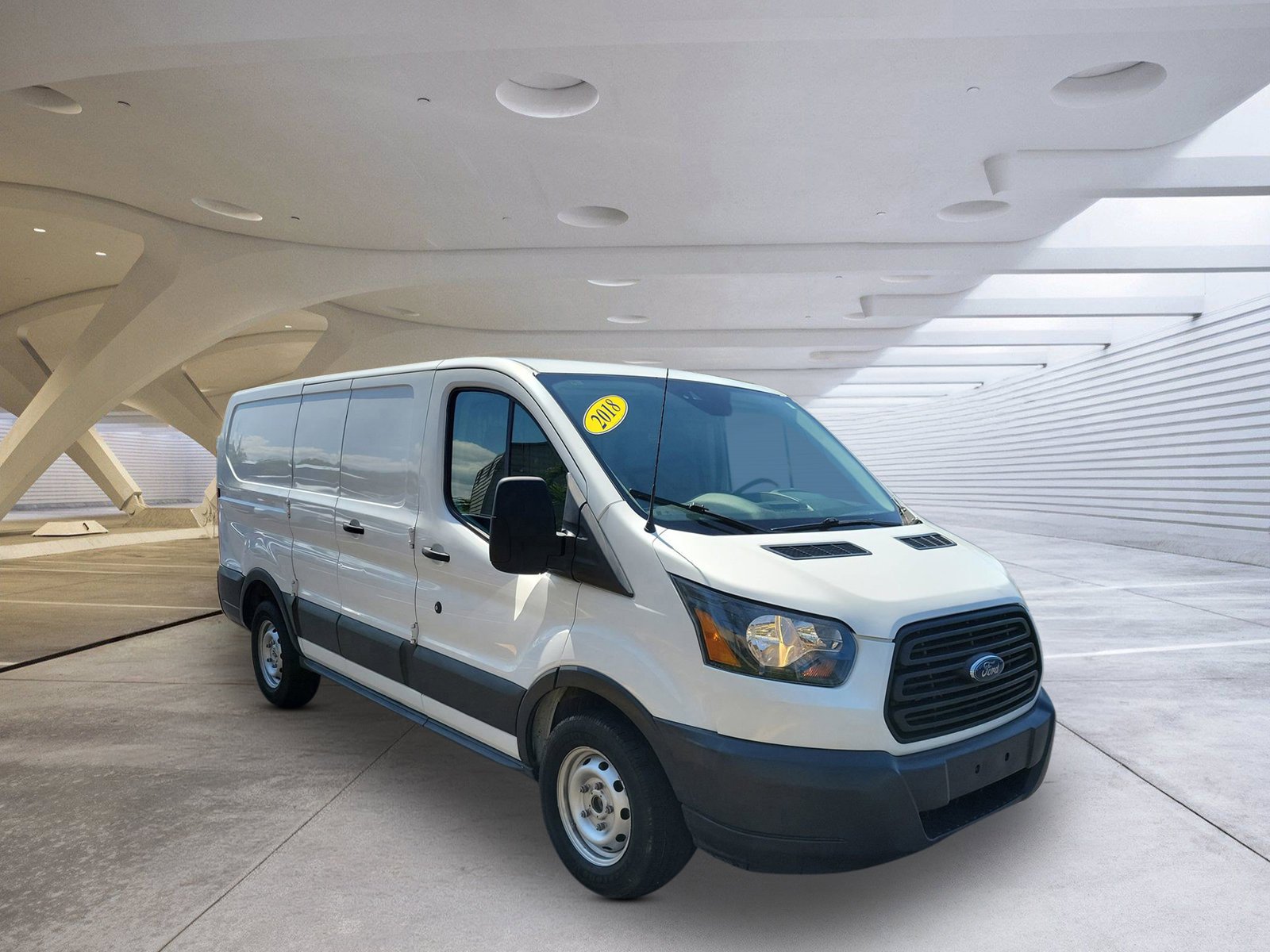 2018 Ford Transit 150 Van Low Roof 60/40 Pass. 130 WB's photo
