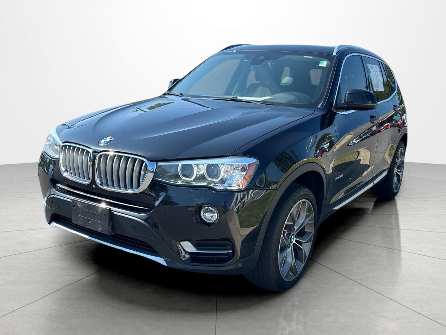 Used 2017 Black Sapphire Metallic BMW xDrive28i image 1