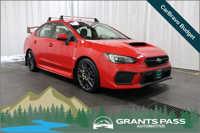Used 2019 Pure Red Subaru STi image 1