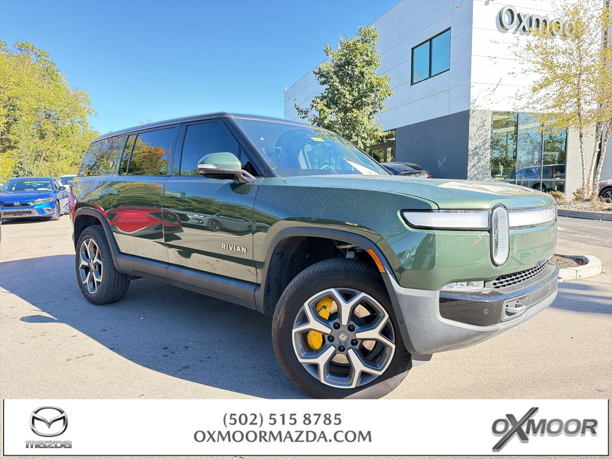 Used 2023 Forest Green Rivian Adventure image 1
