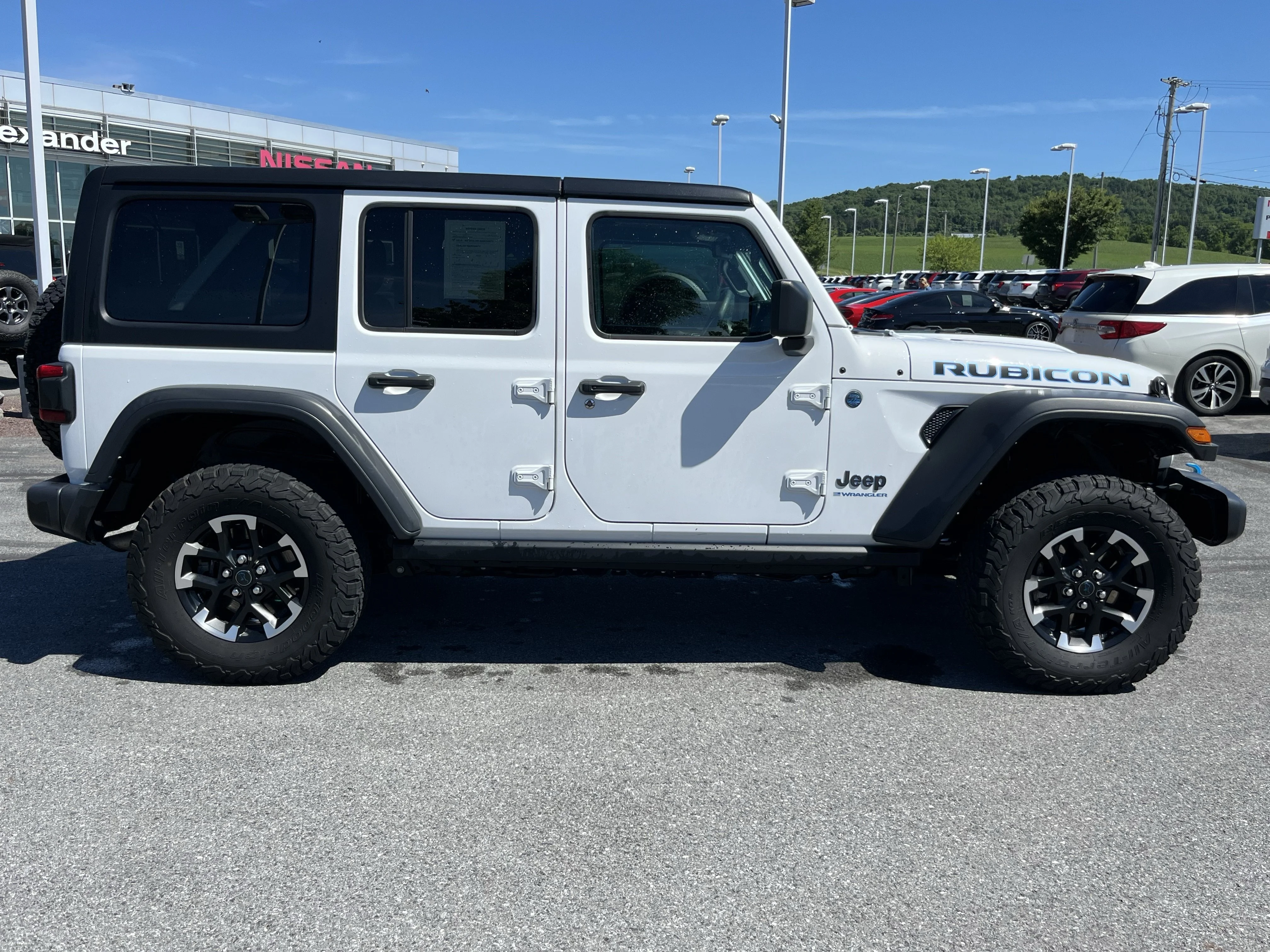 Used 2024 Bright White Clearcoat Jeep Rubicon 4xe image 2