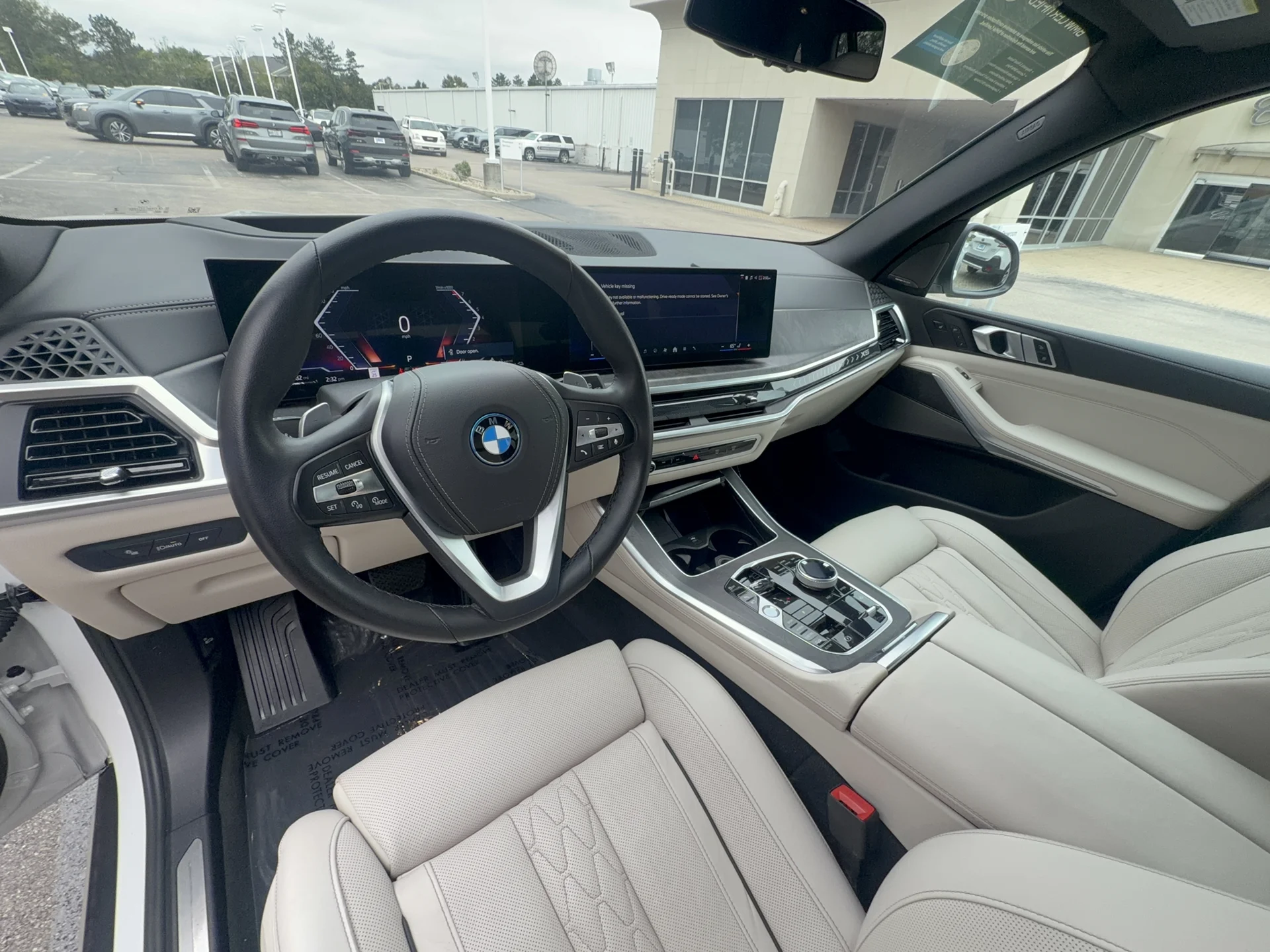 Certified Used 2024 Mineral White Metallic BMW xDrive50e image 12