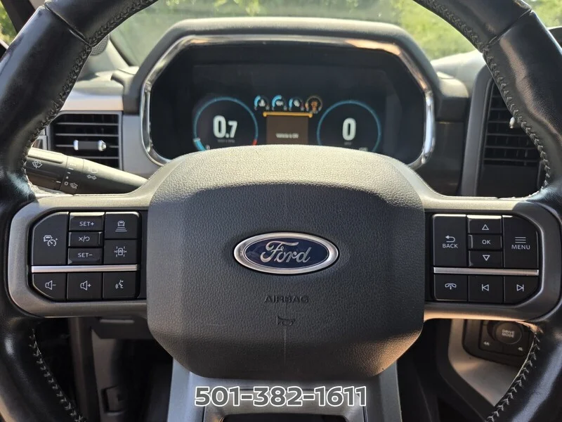Used 2021 Black Metallic FORD LARIAT 4WD SUPERCREW 5.5