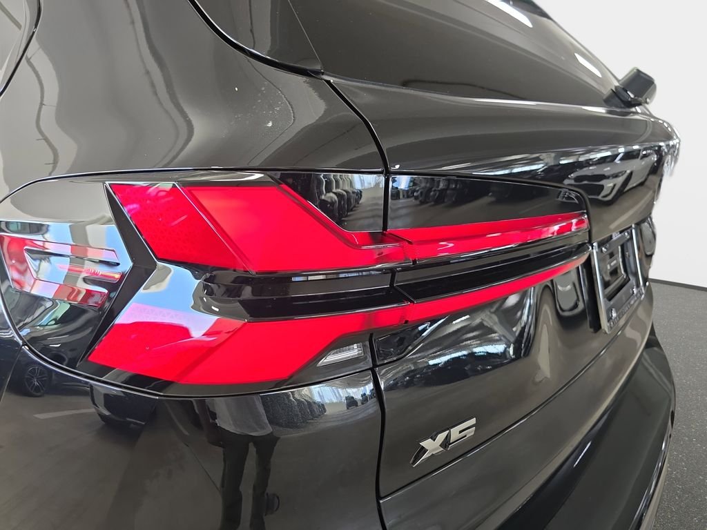 New 2026 Black Sapphire Metallic BMW M60i image 22