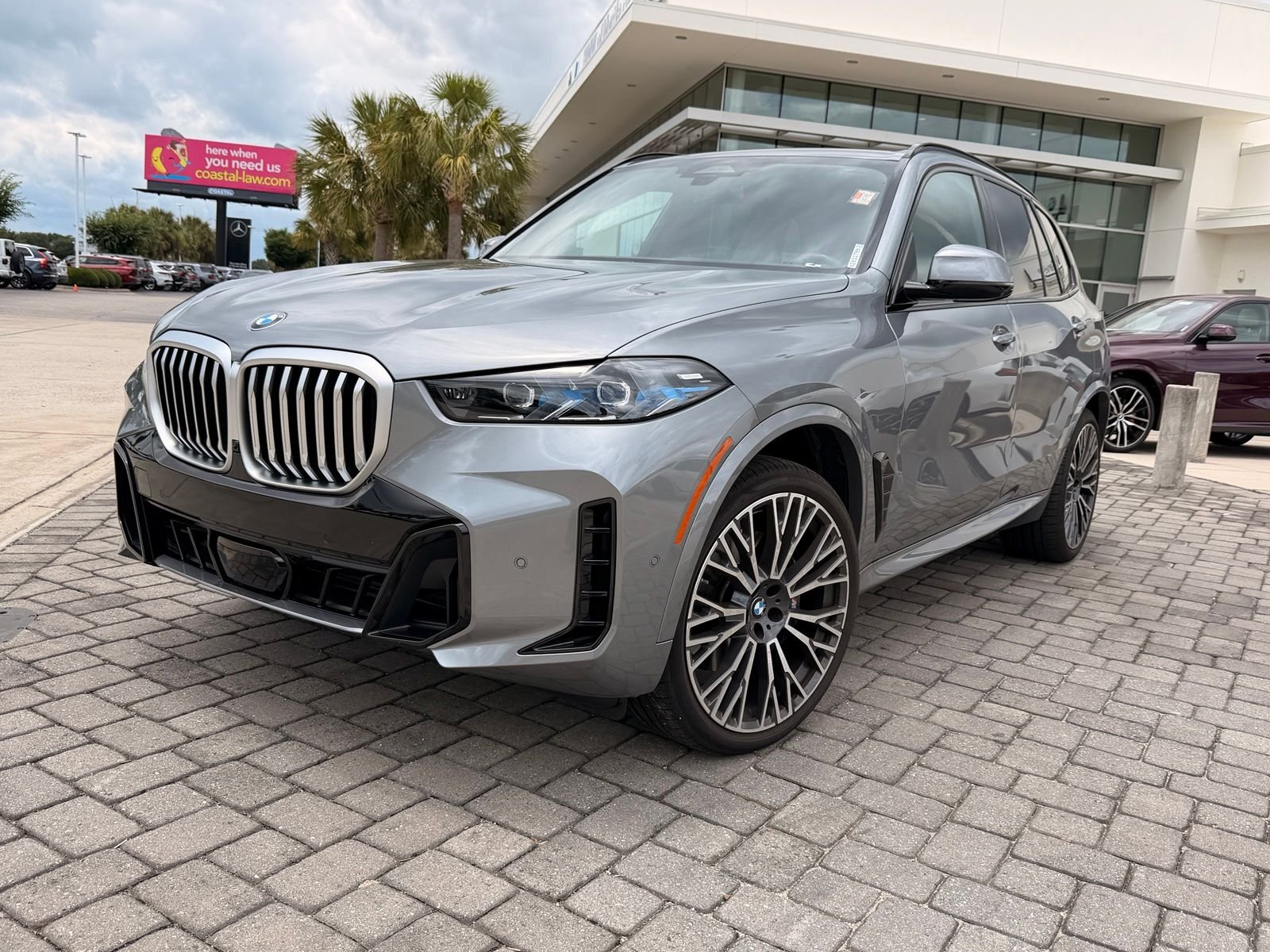 Certified Used 2025 Gray Metallic BMW xDrive40i image 1