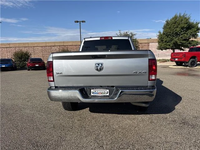 Used 2024 Granite Crystal Metallic Clearcoat RAM SLT 4x4 Quad Cab 6.3 ft. box 140 in. WB image 6