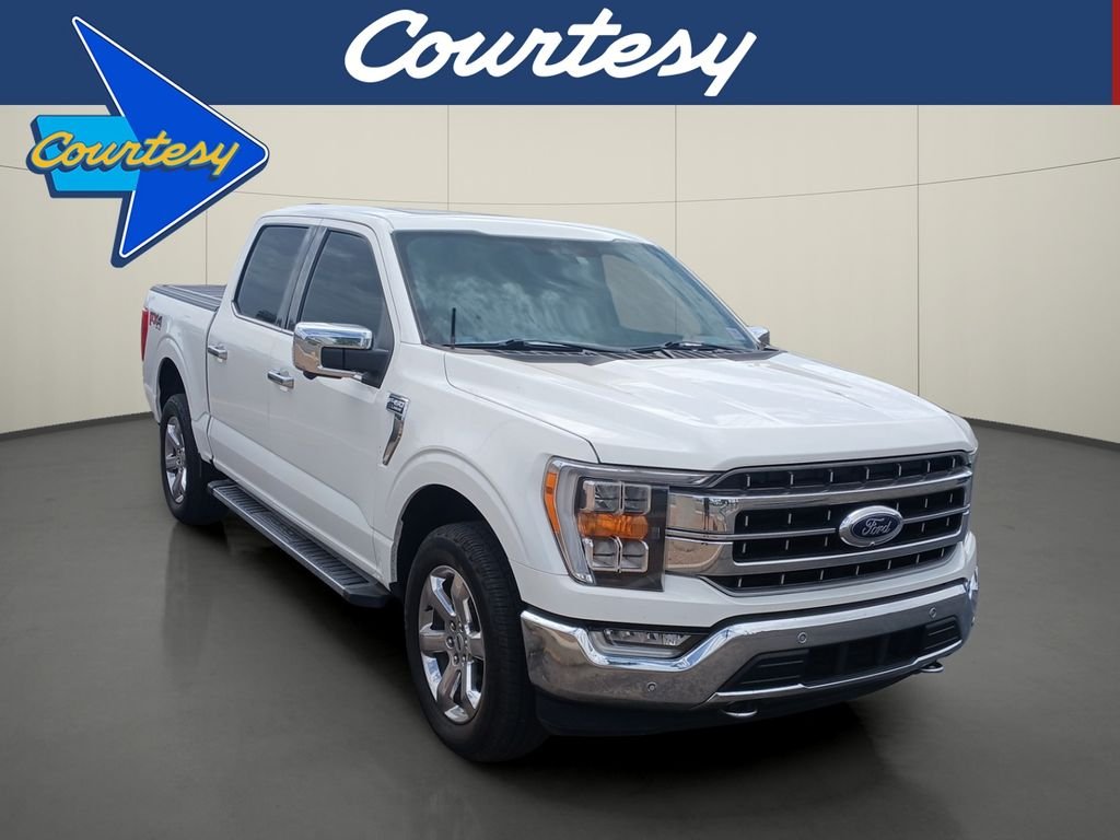 Used 2021 White Ford Lariat image 1