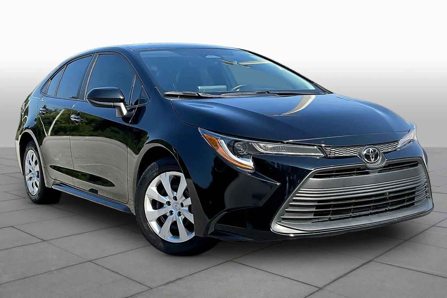 Used 2024 Midnight Black Metallic Toyota LE image 3