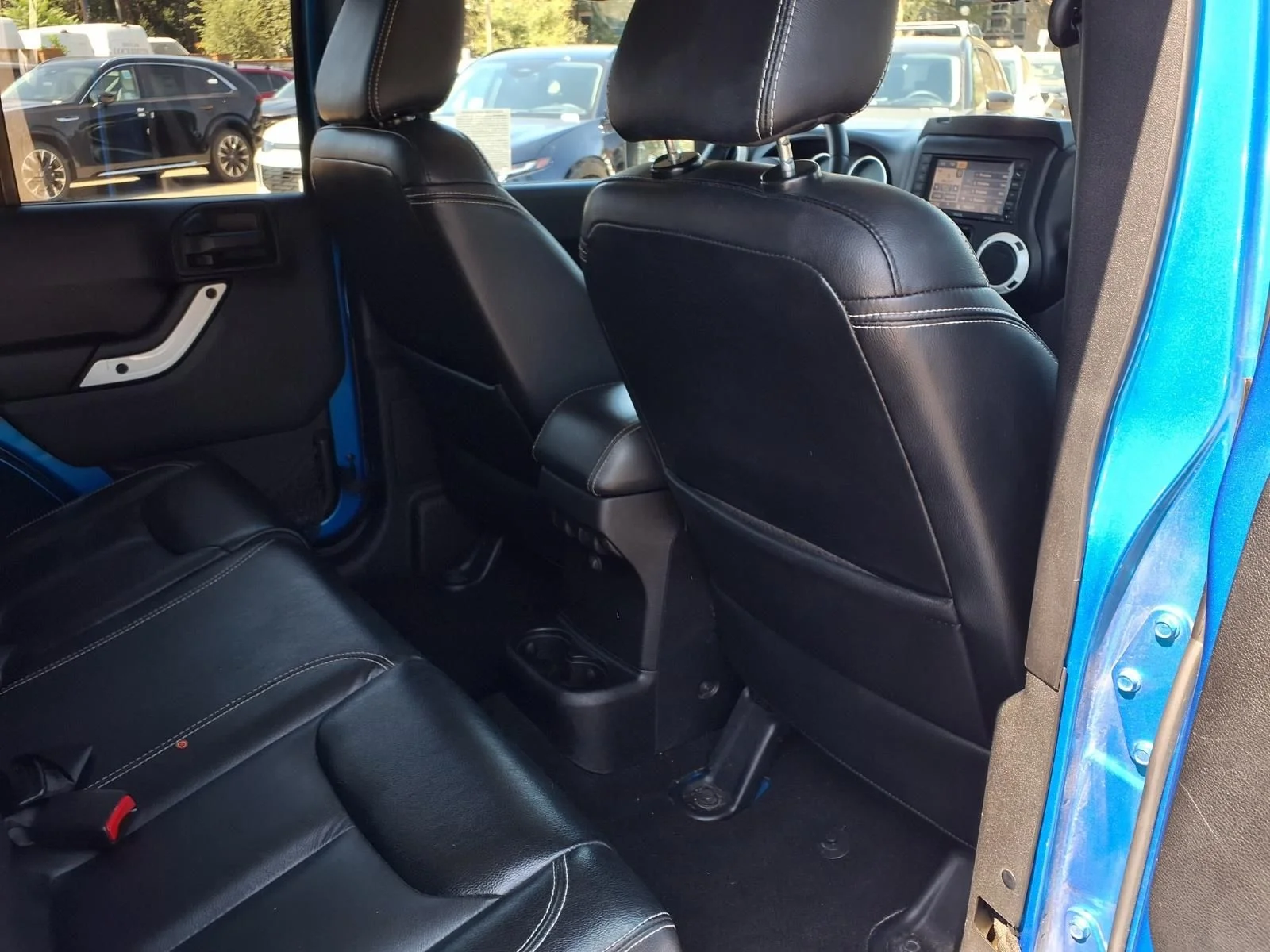 Used 2014 Blue Jeep Unlimited Sahara image 21