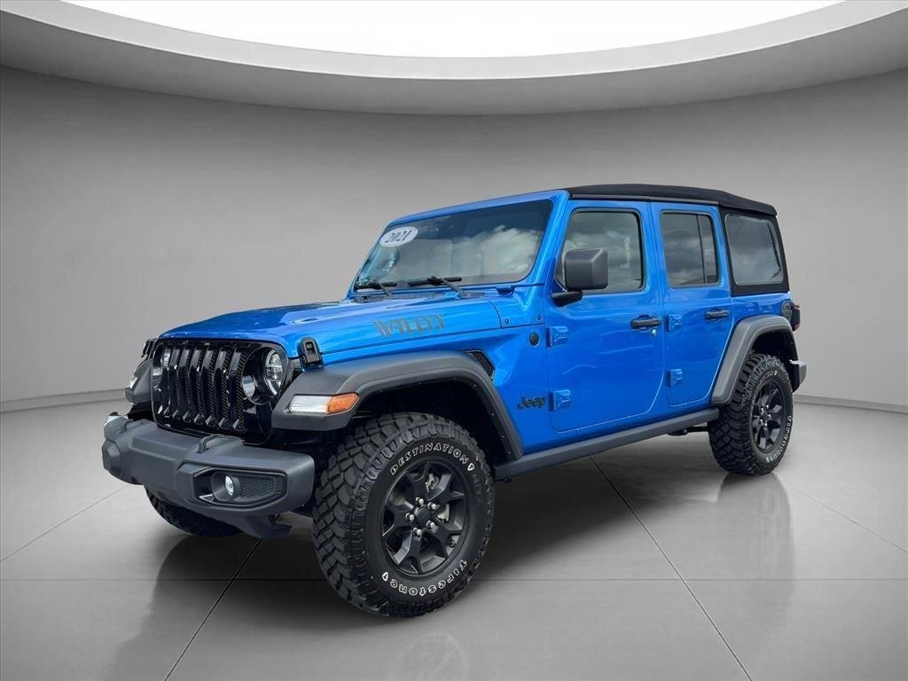 Used 2021  JEEP SPORT image 1