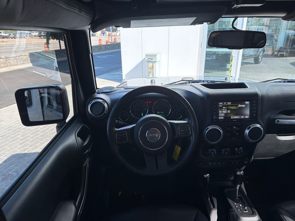Used 2016 Silver Jeep Unlimited Sahara image 13