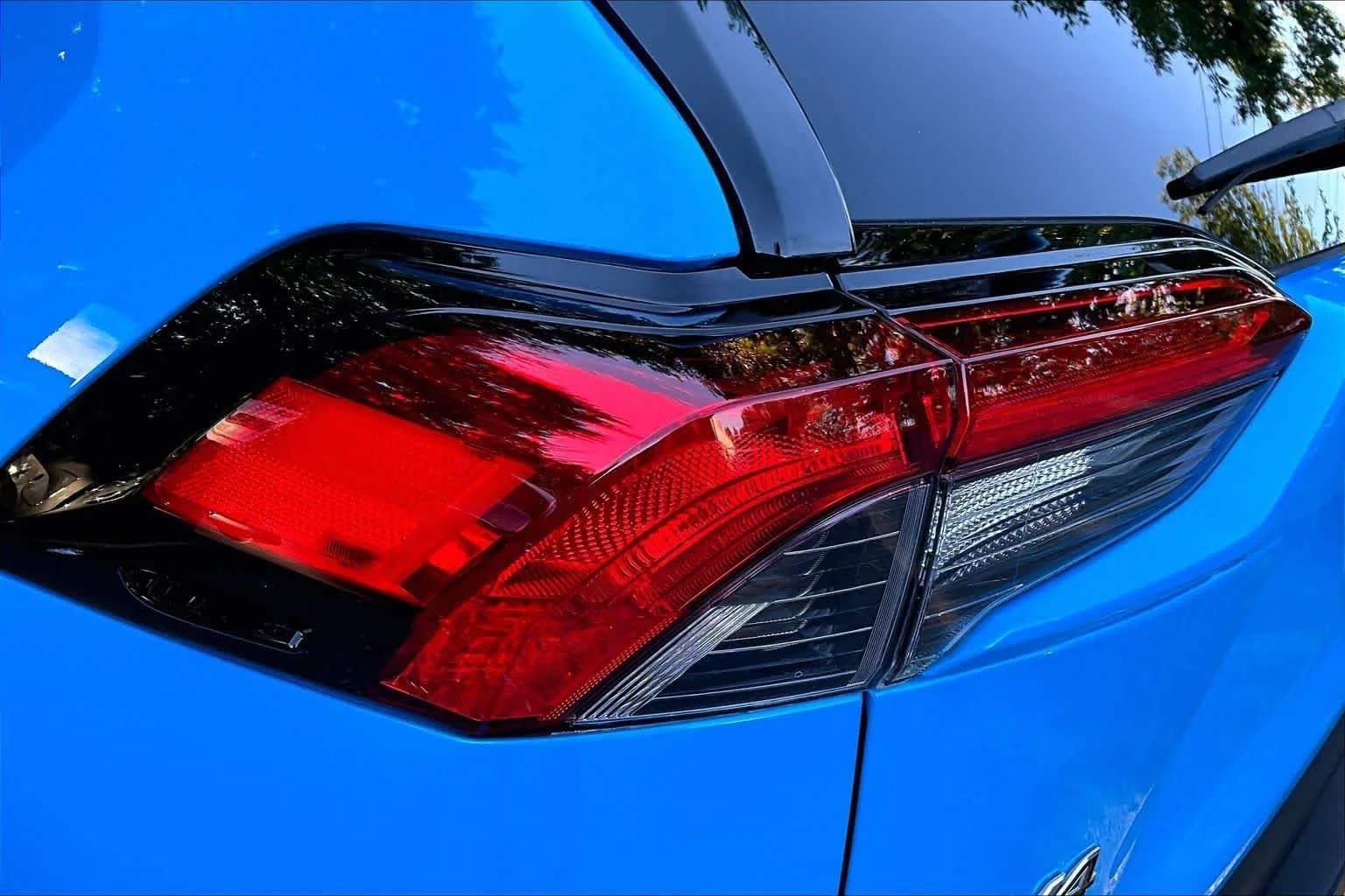 Used 2021 Blue Flame Toyota Hybrid XLE image 27