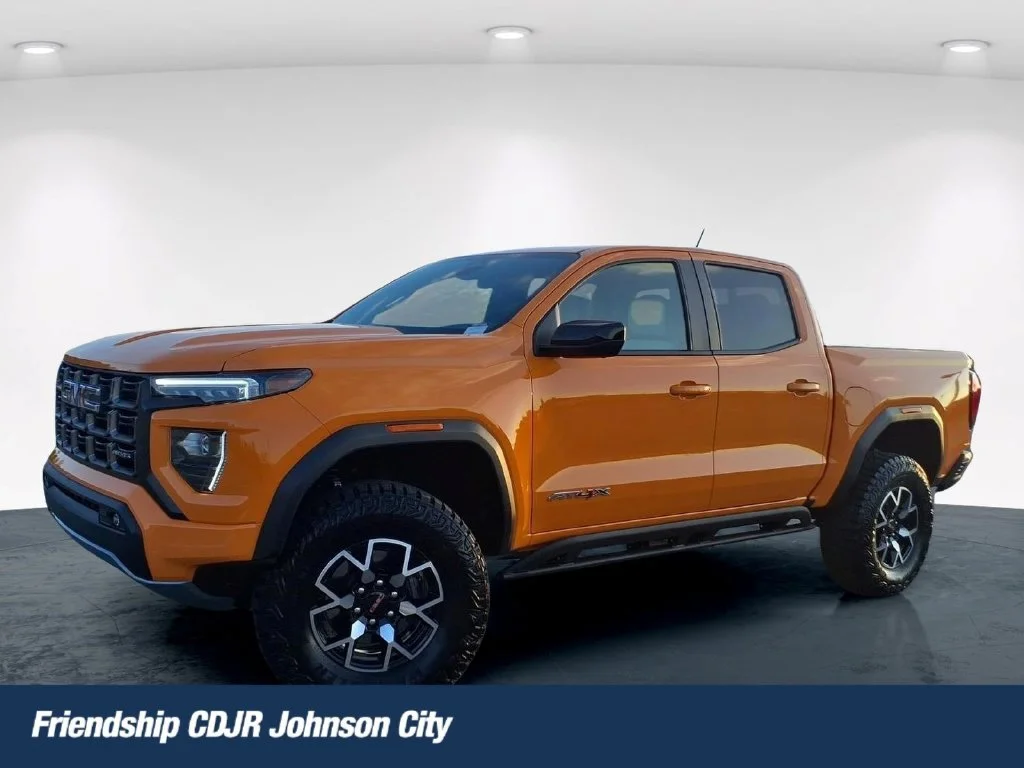 Used 2026 Orange GMC AT4X image 1